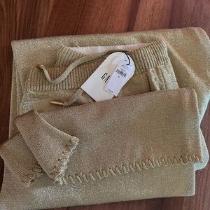 Cult Gaia Gold Joggers with Elegant Detailing